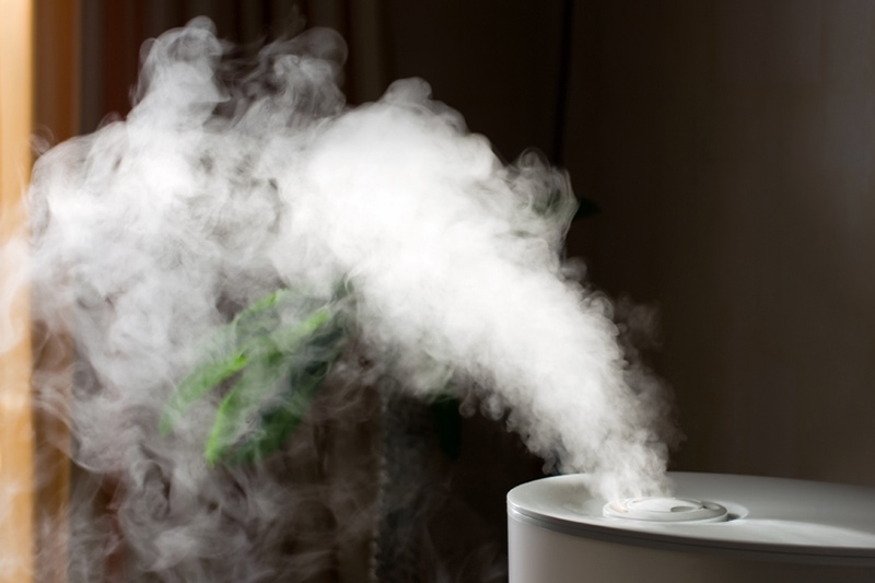 Humidifier spreading steam into the living room in Westford, MA