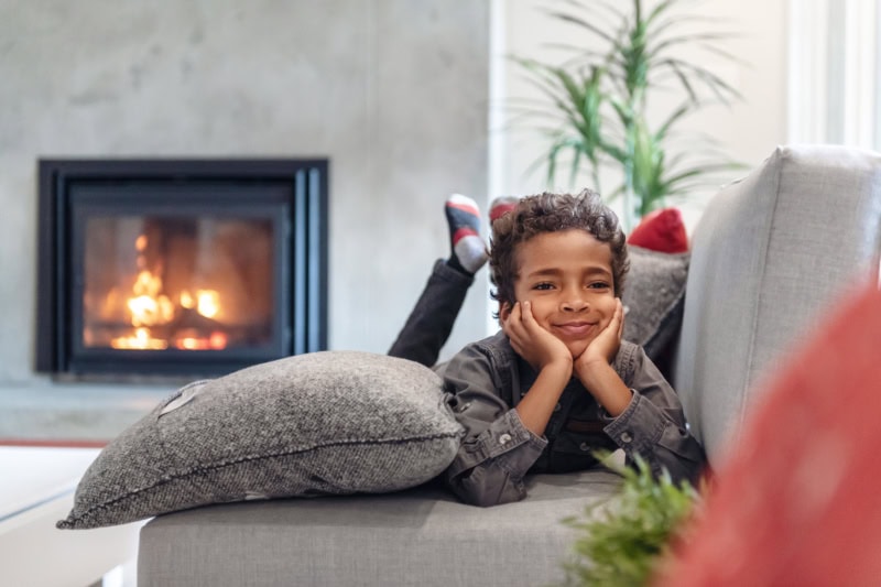 Is My Home Energy Efficient? Boy on couch.