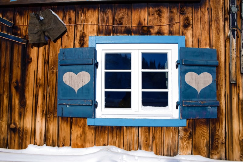 Protect Your Plumbing From Freezing Weather. House in snowy weather.