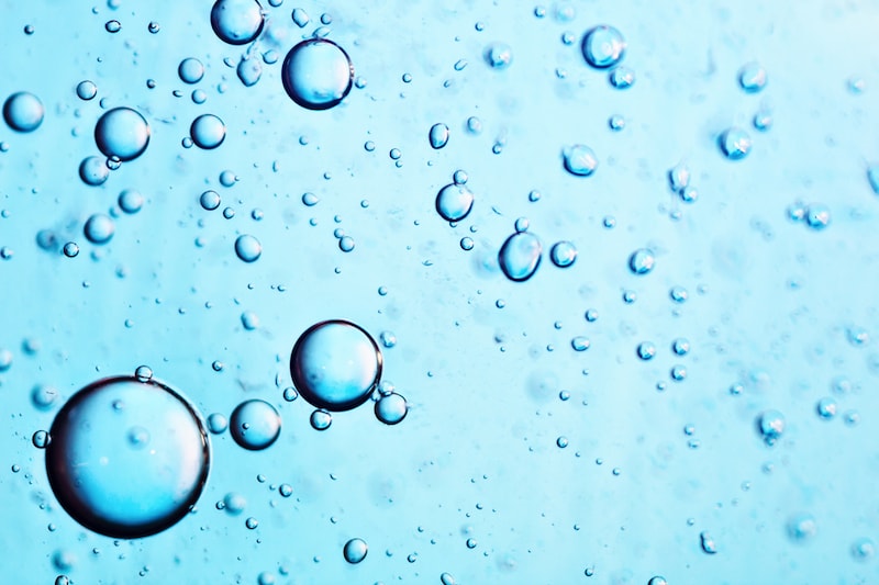 Macro shooting of water bubbles against a blue background, Help You Save Water