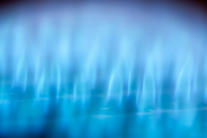 Close-up view of blue flames in gas boiler, Gas Furnace